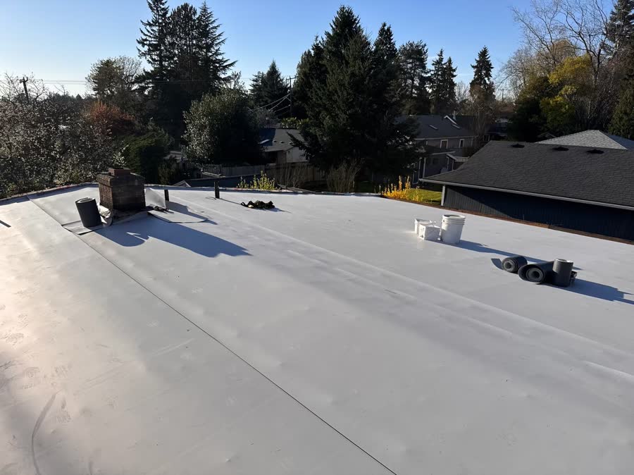 New white membrane flat roof after replacement